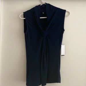 Business or office! Navy blue Top!Premise ! Brand-new with a tug!